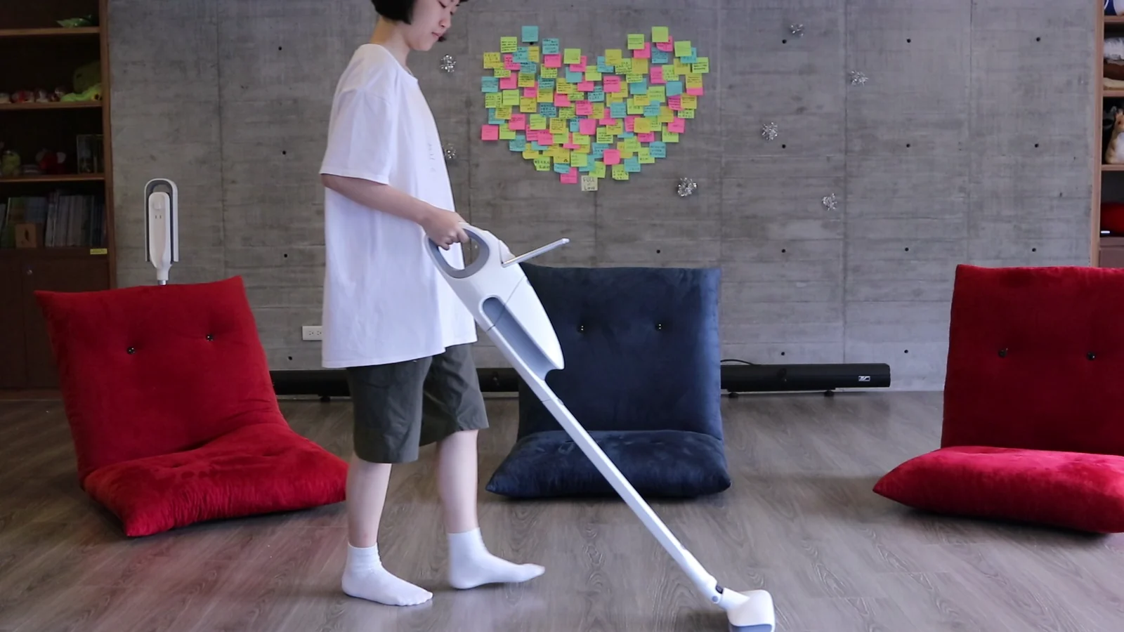 Physical play test using the vacuum cleaner and projected game enemies